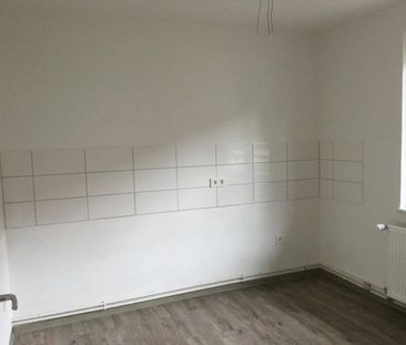 Renovierte 2-Zimmer-Wohnung im EG mit Tageslichtbad! - Foto 1