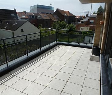 Appartement met groot terras en ondergrondse autostaanplaats. - Foto 1