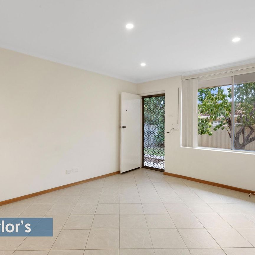 WELL MAINTAINED & IN SMALL GROUP OF 3 UNITS - Photo 1