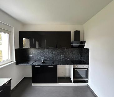 IHR NEUER RÜCKZUGSORT – Moderne EG-Wohnung mit Balkon, EBK & Wohlfü... - Photo 2