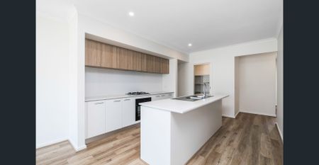 **RECEIVE ONE MONTH FREE RENT, ASK US HOW! Modern 4-Bedroom Townhome for Lease in Cloverton Estate - Photo 5