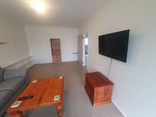 Tidy two bedroom unit - semi furnished - Photo 1