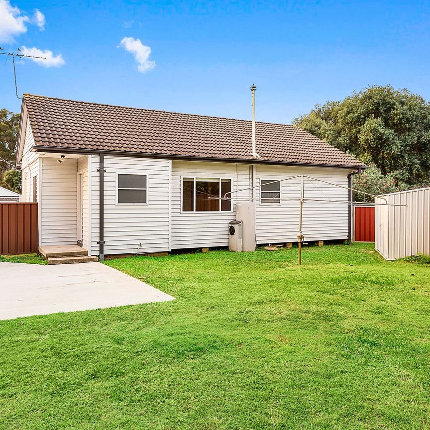 Charming 3-Bedroom Home with Modern Amenities and Ample Outdoor Space - Photo 1