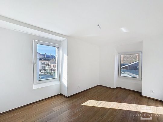 Charmant appartement de 3.5 pièces au 1er étage - Photo 1