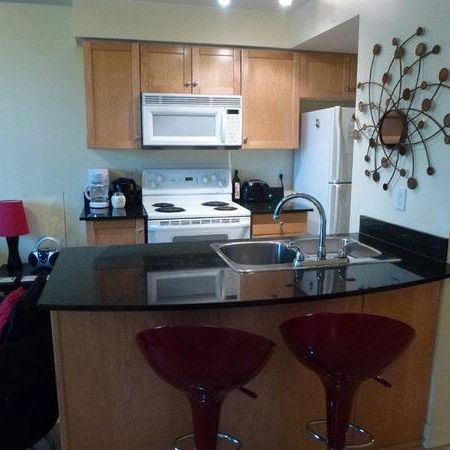 Available NOW, downtown one bedroom plus den condo - Photo 4