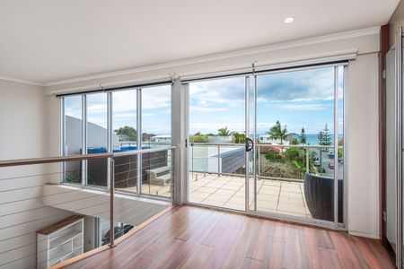 Elevated Coastal Lifestyle moments from the beach - Photo 3