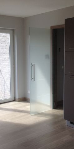 appartement met 2 slpk en autostaanplaats nabij centrum - Photo 1