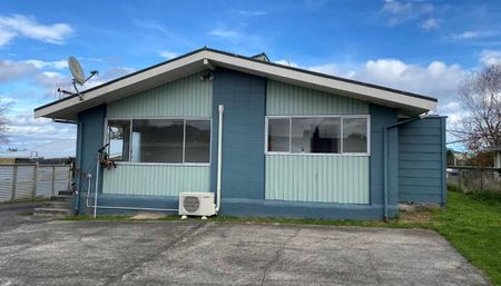 Charming Two-Bedroom Unit with Fresh Updates and Easy Living - Photo 4