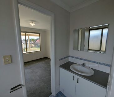 PLEASANT WELL PRESENTED FAMILY HOME - Photo 4
