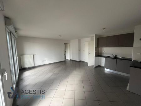 Location Appartement 4 pièces 81m² TOULOUSE 31200 - Photo 2
