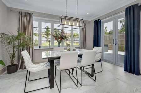 A beautifully presented three bedroom semi detached home set over three floors within 22 acres of woodland. - Photo 3