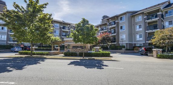 Two Bed, Two Bath Condo with Two Side by Side Parking Spaces and Storage in Walnut Grove Langley - Photo 2