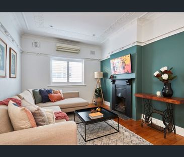 Top-Floor Two Bedroom House Sized Apartment! - Photo 1