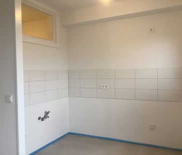 Modernisierte Single-Wohnung mit Balkon! - Foto 1
