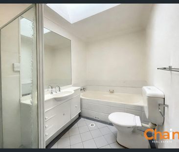 Bright & Spacious Full-Brick Townhouse in a Highly Convenient Location - Photo 4