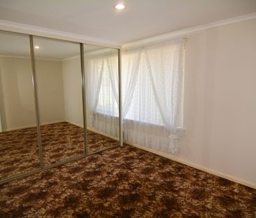 NEAT FAMILY HOME - Photo 3