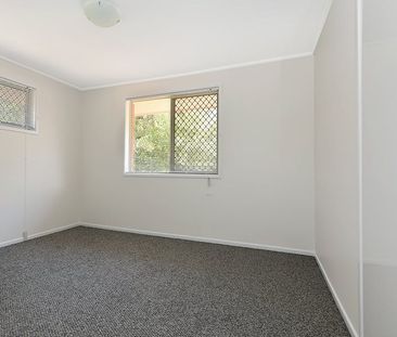 Renovated unit in sought after location - Photo 4