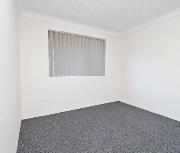 VALUE PACKED TWO-BEDROOM APARTMENT! - Photo 4