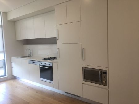 North Facing One Bedroom with Bedroom Sized Study and Parking! - Photo 2