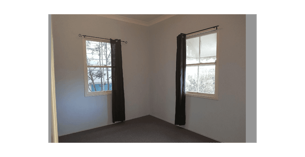 Charming Queensland Cottage in Prime Manly Location – Don’t Miss Out! - Photo 1