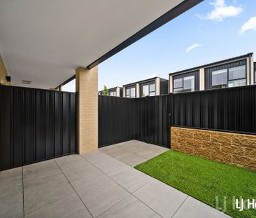 Stylish Split Level 2 Bedroom Home with Triple Garage - Photo 6