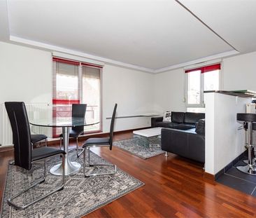 Location Appartement 63m² - Photo 2