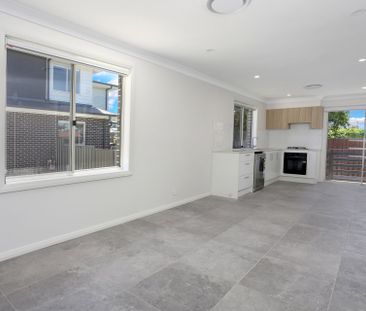 Brand New Four Bedroom Townhouse In Great Location! - Photo 1