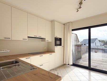 Ruim duplexappartement met terras en garage in Beveren - Photo 4