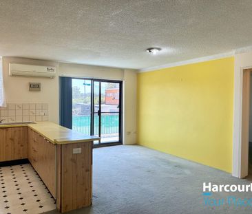 Cozy 2 bedroom unit in prime location - Photo 1