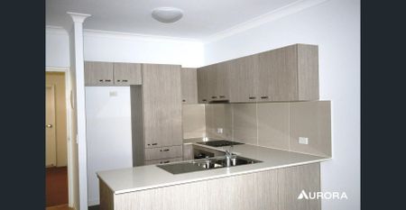 Modern Comfort Meets Inner-City Convenience in Prestigious Clayfield - Photo 2