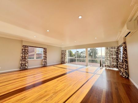 Spacious Home with Sunny Deck & Lawn Included - Photo 2