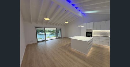 Peaceful, Private & Perfectly Positioned - Live the Gold Coast Dream in This Fully Renovated Waterfront Villa with Solar! - Photo 2