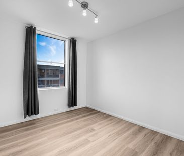 Modern 3-Bedroom Apartment with Stunning City Views - Photo 6
