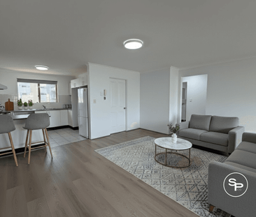 Contemporary Apartment Living in a Prime Central Location - Photo 1