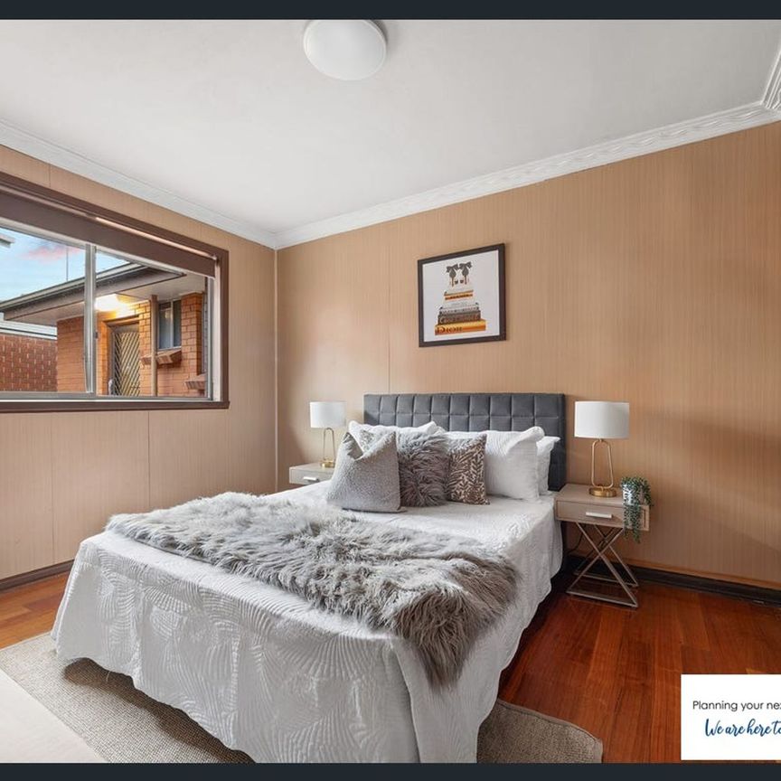Spacious Three-Bedroom Unit - Photo 1