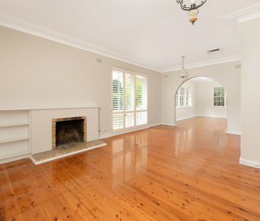 Family home with multiple living areas - Photo 1