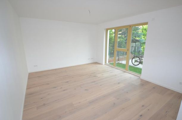 Exklusiver Neubau im Zentrum-Süd! 4-Zimmerwohnung im EG mit Terrasse und Gartenanteil ! - Foto 1