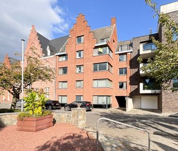 Gezellig duplexappartement in het centrum van Beveren met twee slaa... - Photo 4
