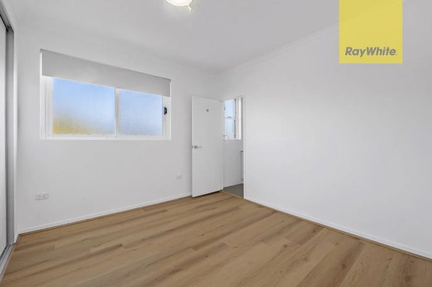 Sanctuary in the Sky: Renovated Top-Floor Apartment with Sweeping Views - Photo 1