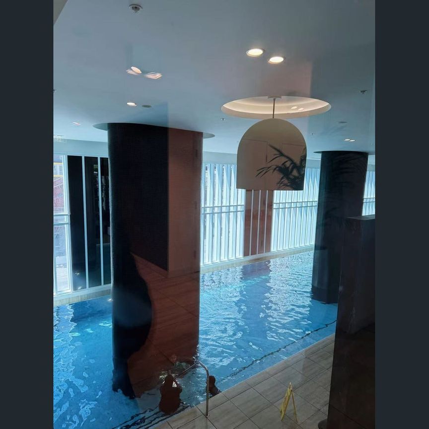 Rare CBD Loft-Style Duplex | Fully Furnished 2-Bedroom Luxury Residence - Photo 1