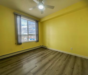 Sunlit 2 Bed + 2 Bath Condo With A/C In Walden | Underground Parking - Photo 3
