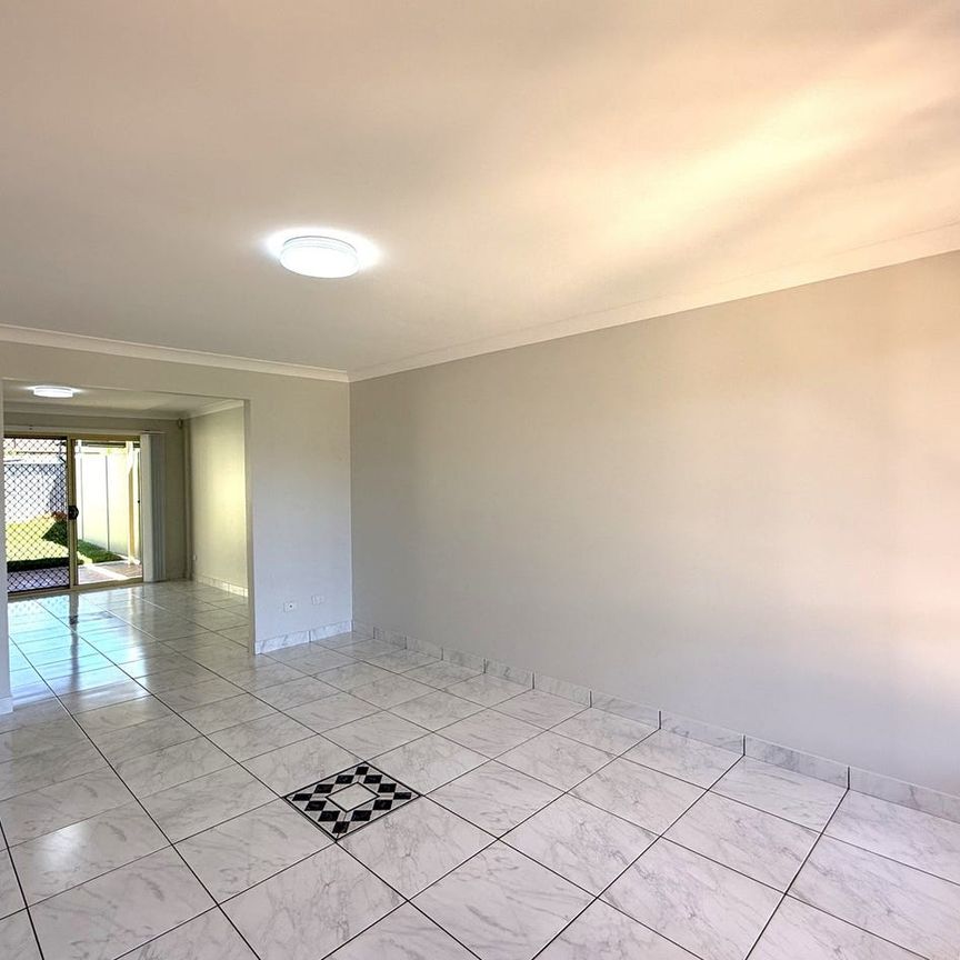 CONTEMPORARY DUPLEX IN HIGHLY DESIRED LOCATION - Photo 1