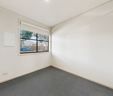Spacious Two Bedroom Home with New Carpet & Off-Street Parking - Photo 4