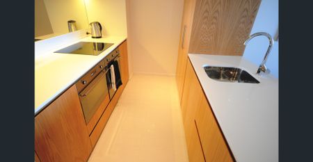 Available Now! Stylish and Modern Highrise Apartment - Photo 5