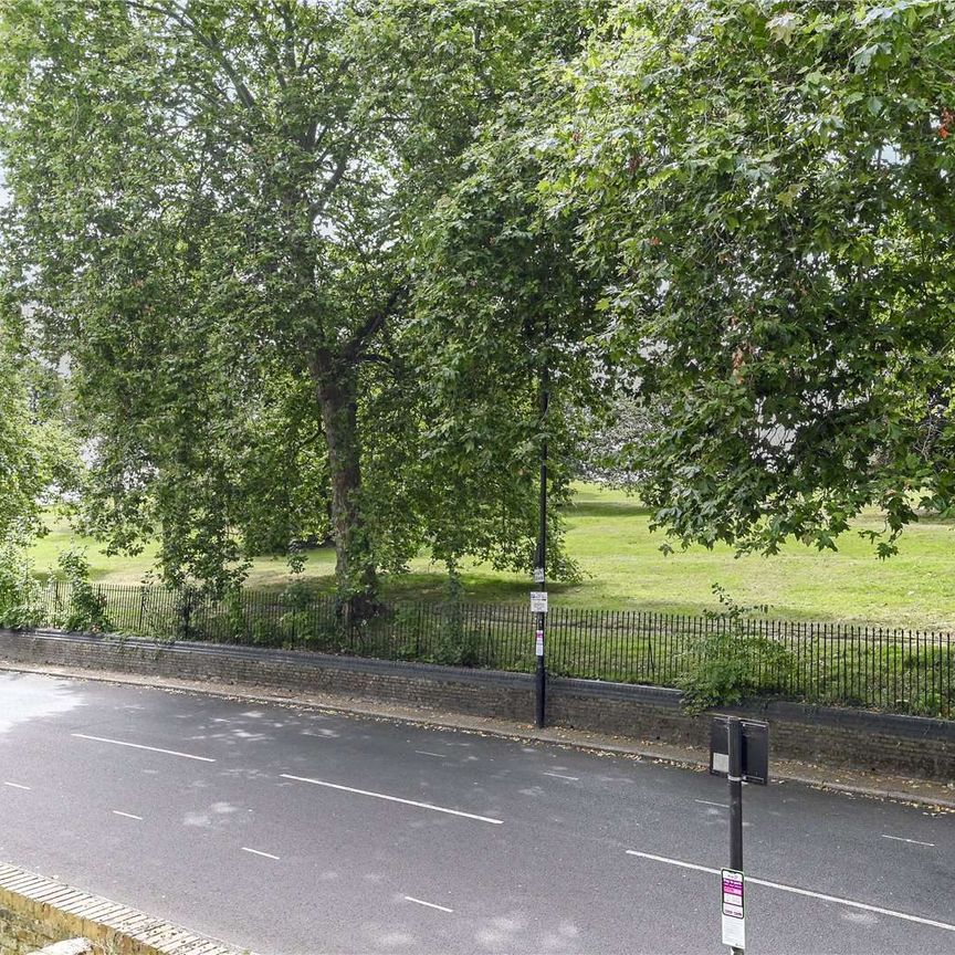 A recently redecorated mid-terrace townhouse, on this quiet road in Primrose Hill Village, opposite the park. - Photo 1