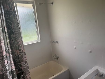 Neat Three-Bedroom Home in Prime Location - Photo 4