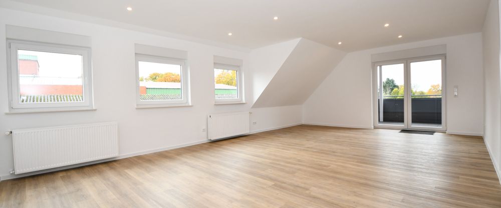 Wohnen mit Wohlfühlcharakter - Mietwohnung mit Balkon, Einbauküche und E-Ladestation in Altenoythe - Photo 1