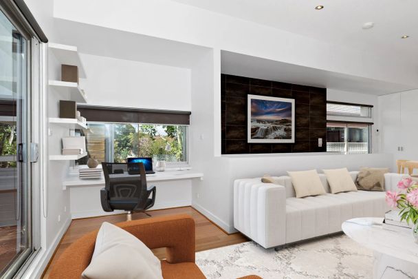 Modern Two-Bedroom Townhouse with Balcony and Secure Garage - Photo 1