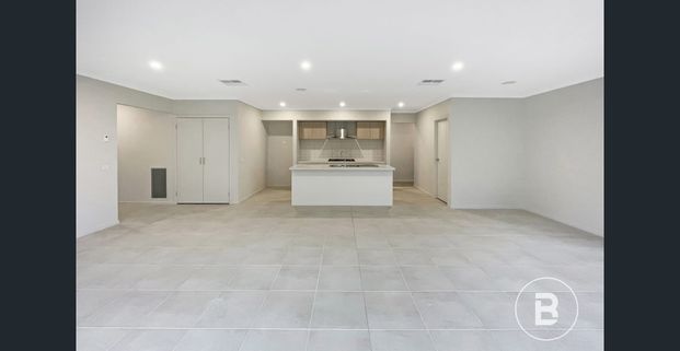 FOUR BEDROOM HOME WITH TWO SPACIOUS LIVING AREAS - Photo 1