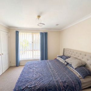 Spacious Family Home in a Prime Glenmore Park Location - Photo 2